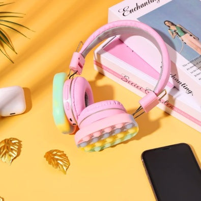 Kids Wireless LED Headphones – Pop-It Stress Relief & Soft Comfort Design